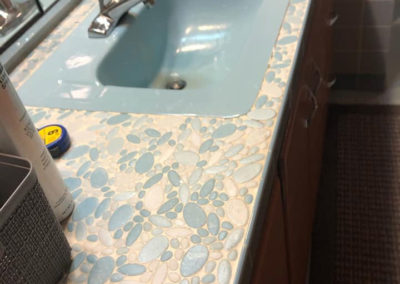 Blue patterned bathroom sink before