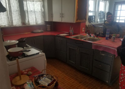 Kitchen topped with red finish before